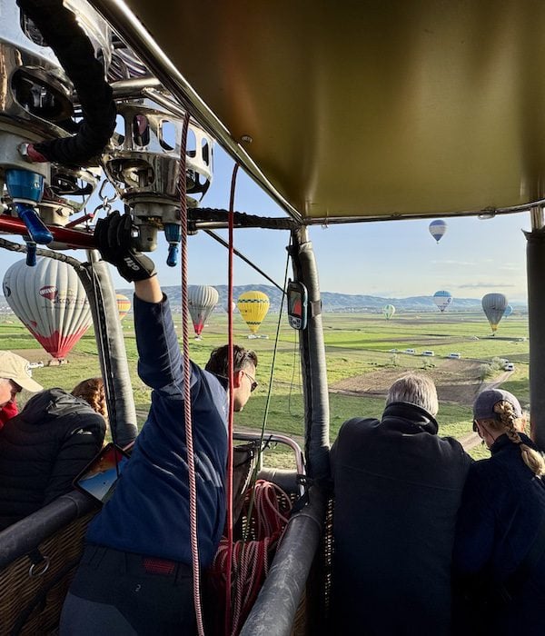 Hot air balloon pilot Ümit Ertosun at work