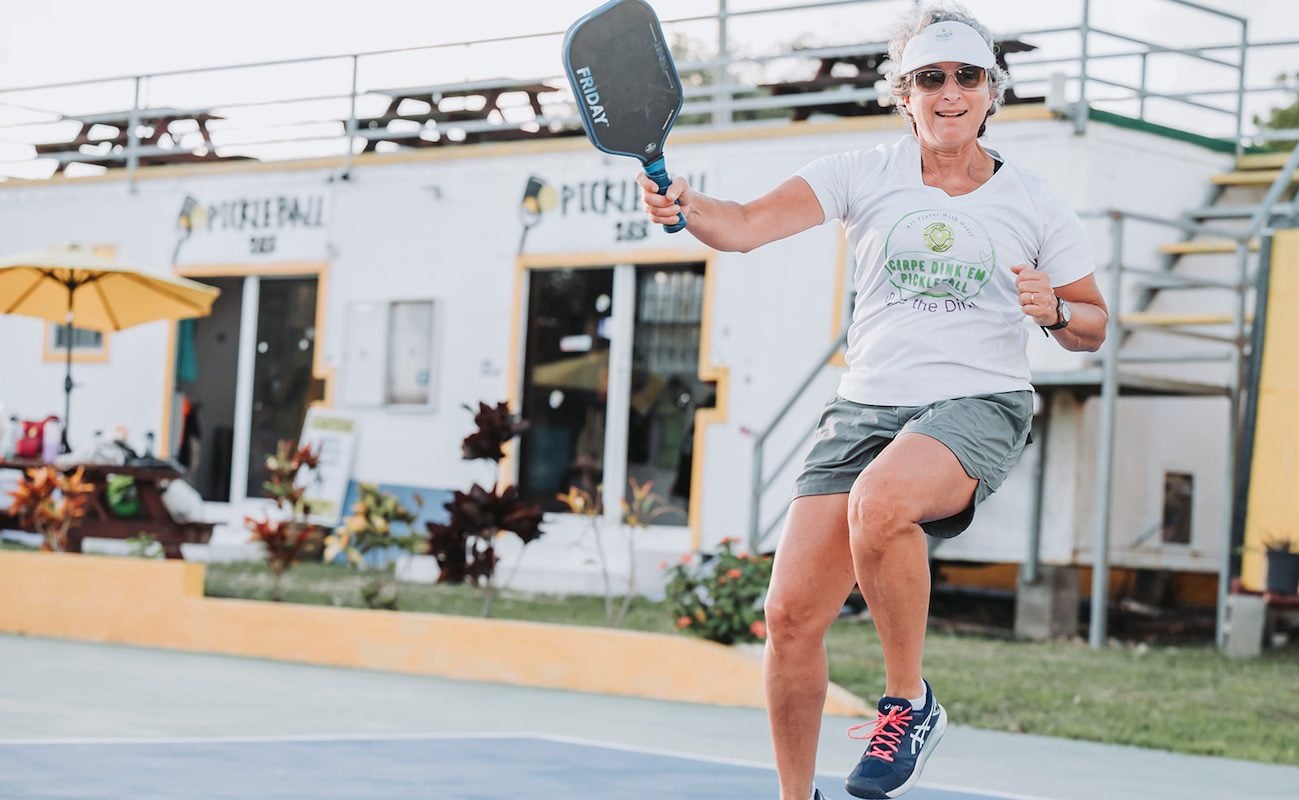 Pickleball for Women Melinda Alcosser Founder of With Heart Travel, during a jump shot
