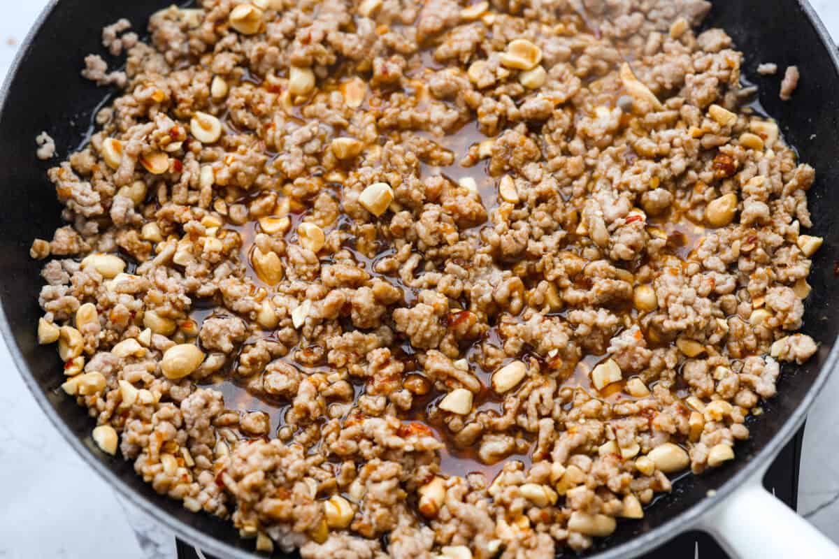 These dragon noodles are the ultimate weeknight dinner when you’re craving big flavor fast. Tender noodles, spicy-sweet sauce, and savory pork come together for a dish that’s fast, fiery, and seriously addictive. Sauce added to the cooked pork.