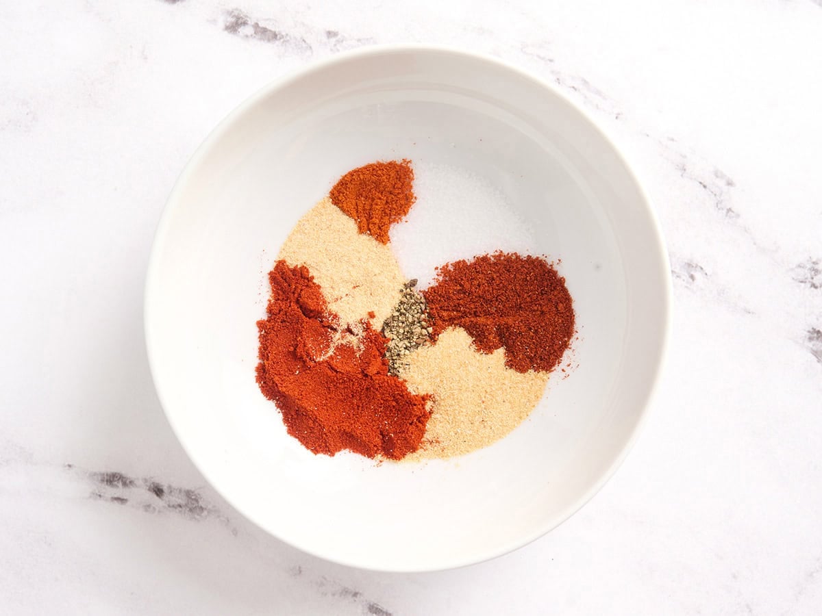 Seasonings for homemade burger seasoning in a bowl.