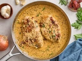 Overhead view of a marry me chicken recipe in a skillet.