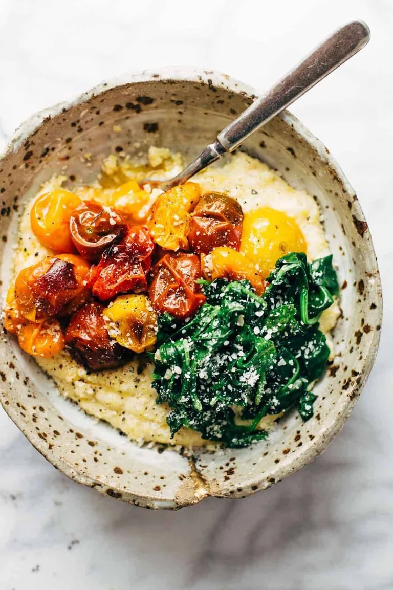 Burst tomatoes with polenta and greens.