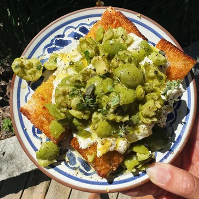 Smashed olives with burrata.