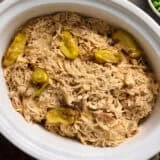 Overhead view of a crockpot of Mississippi chicken.