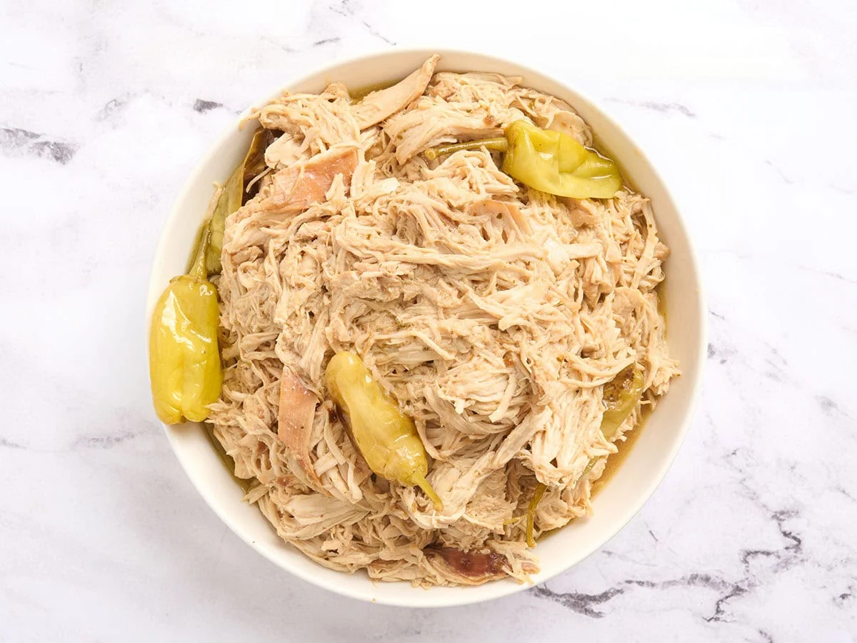 Shredded Mississippi chicken in a bowl.