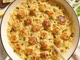 Overhead view of a chicken piccata meatball and orzo skillet.