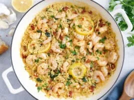 Overhead view of a garlic shrimp and orzo skillet.