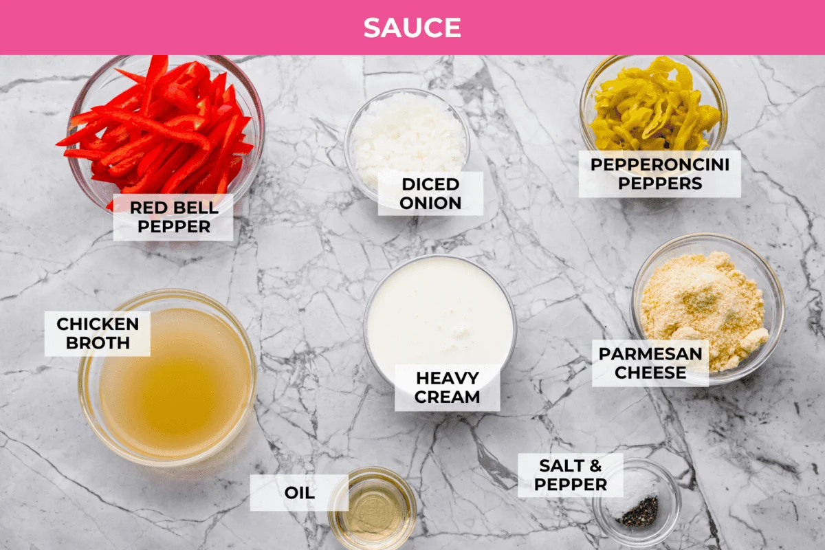Creamy pepperoncini chicken is an easy one-skillet dinner packed with flavor! Tender chicken is smothered in a rich Parmesan cream sauce with bell peppers and tangy pepperoncini. It's the perfect balance of creamy, savory, and zesty flavor. Overhead shot of labeled sauce ingredients.