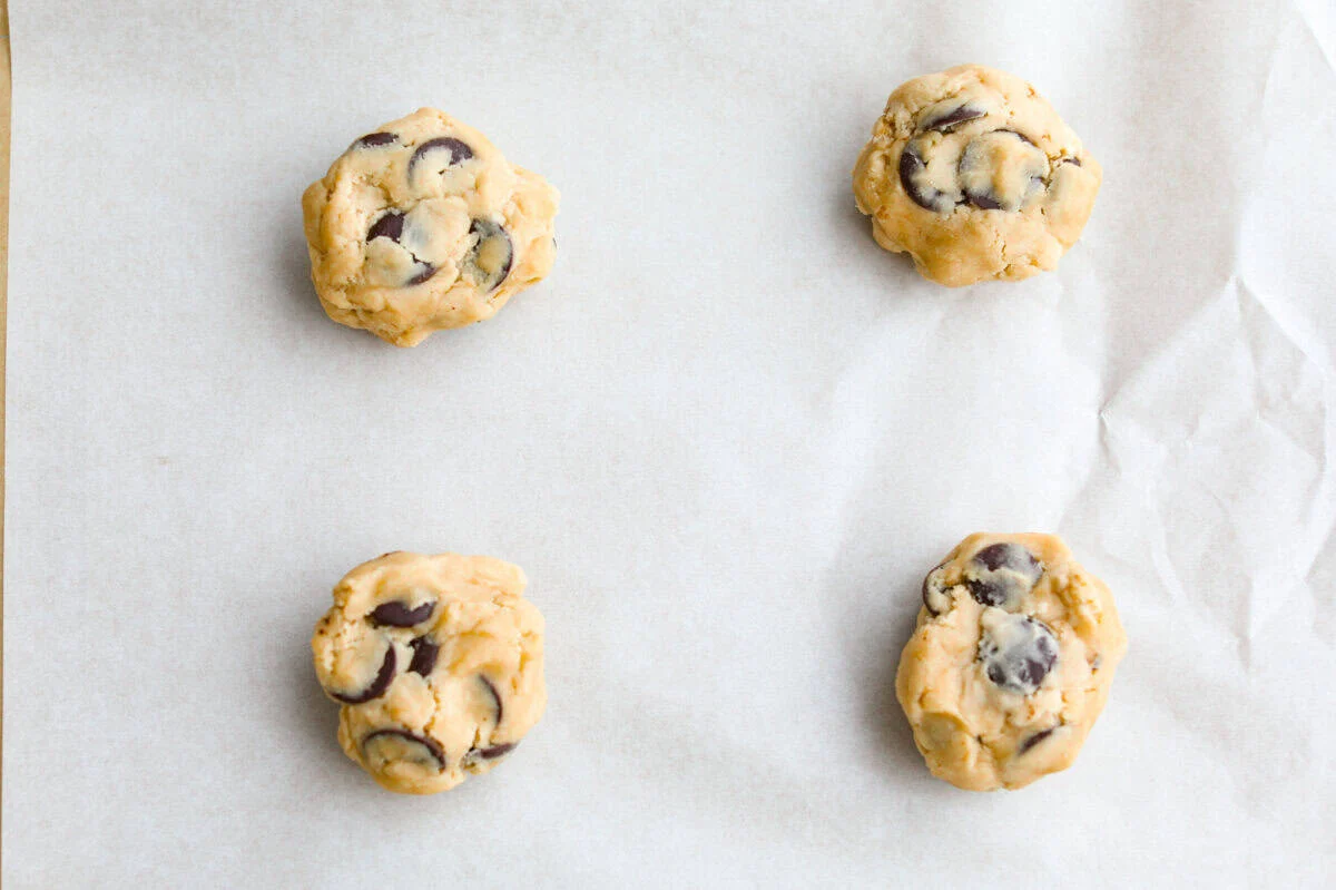 Each cookie dough bal l place on the cookie sheet.