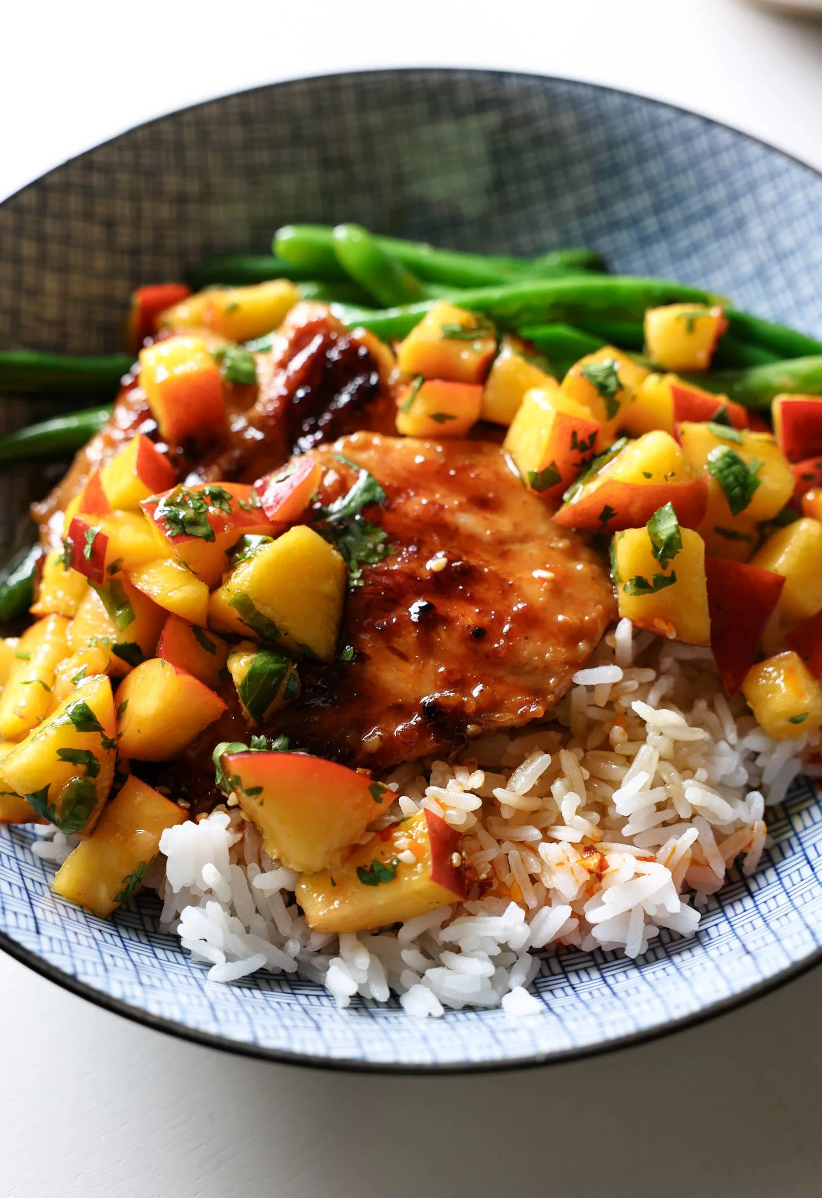 Teriyaki chicken in a bowl.