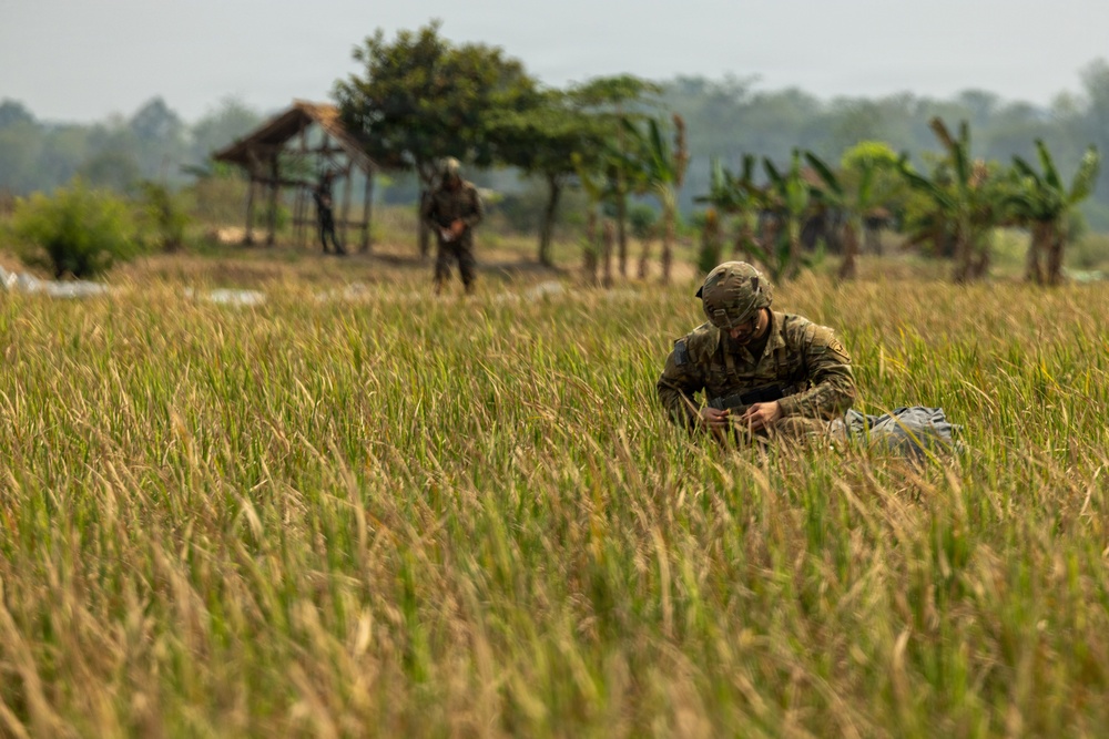 Multinational paratroopers open field training with airborne jump
