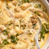 Overhead close up of homemade zuppa toscana in a bowl with a spoon.