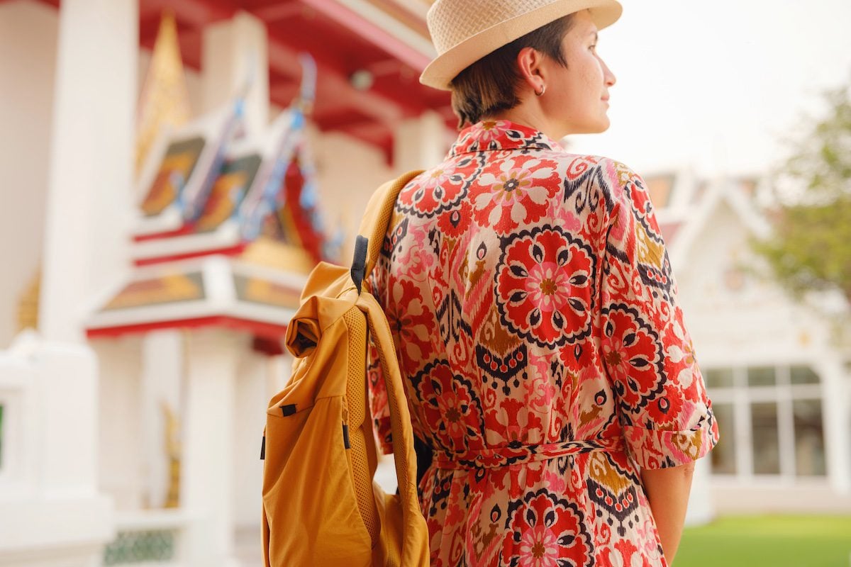 Woman Exploring Colorful Streets 
