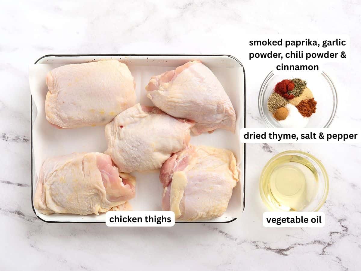 The ingredients for sheet pan chicken thighs with labels.