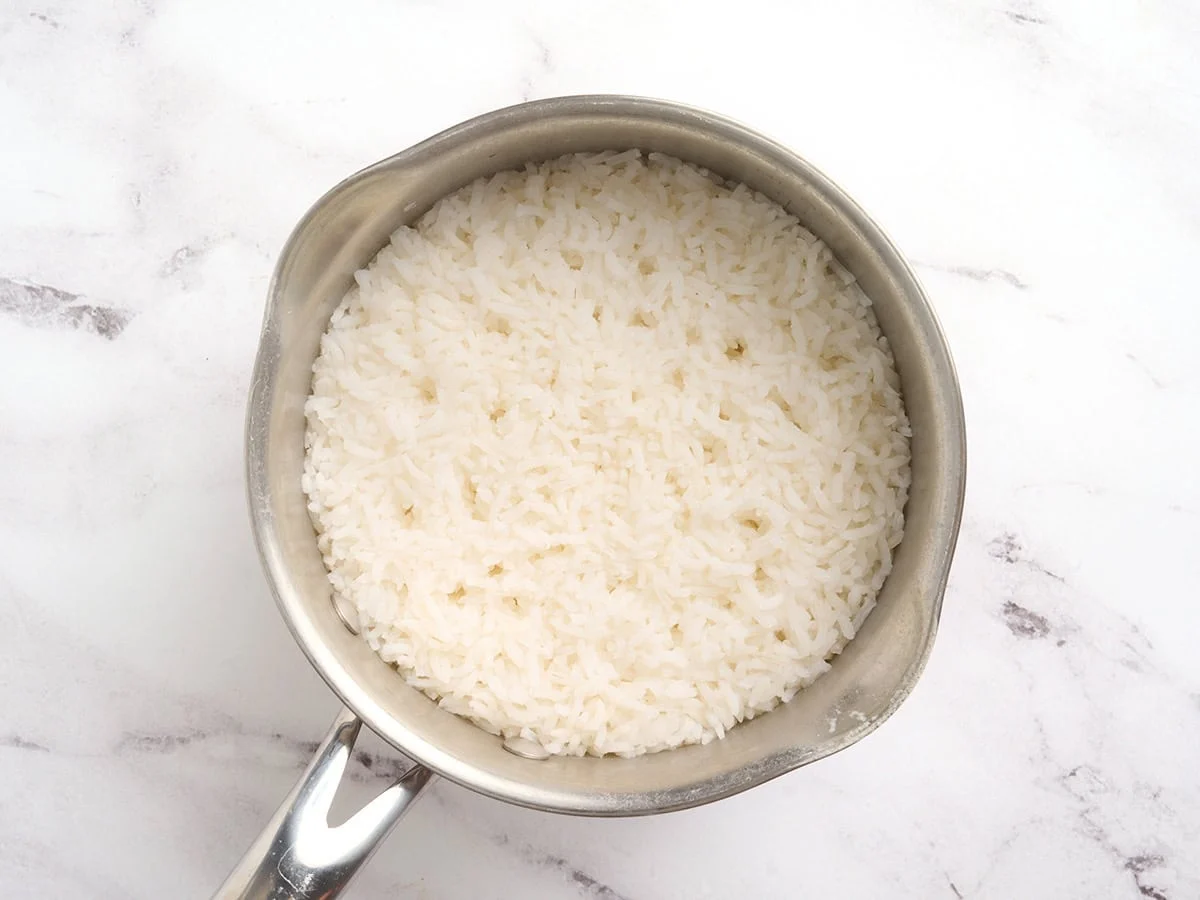 Cooked rice in a sauce pan.