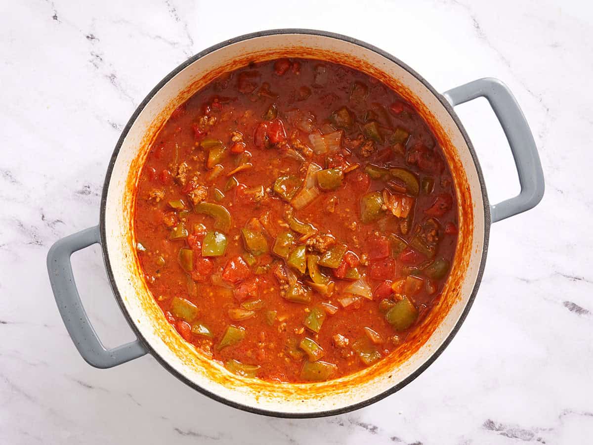 Stuffed pepper soup in a pot being simmering.