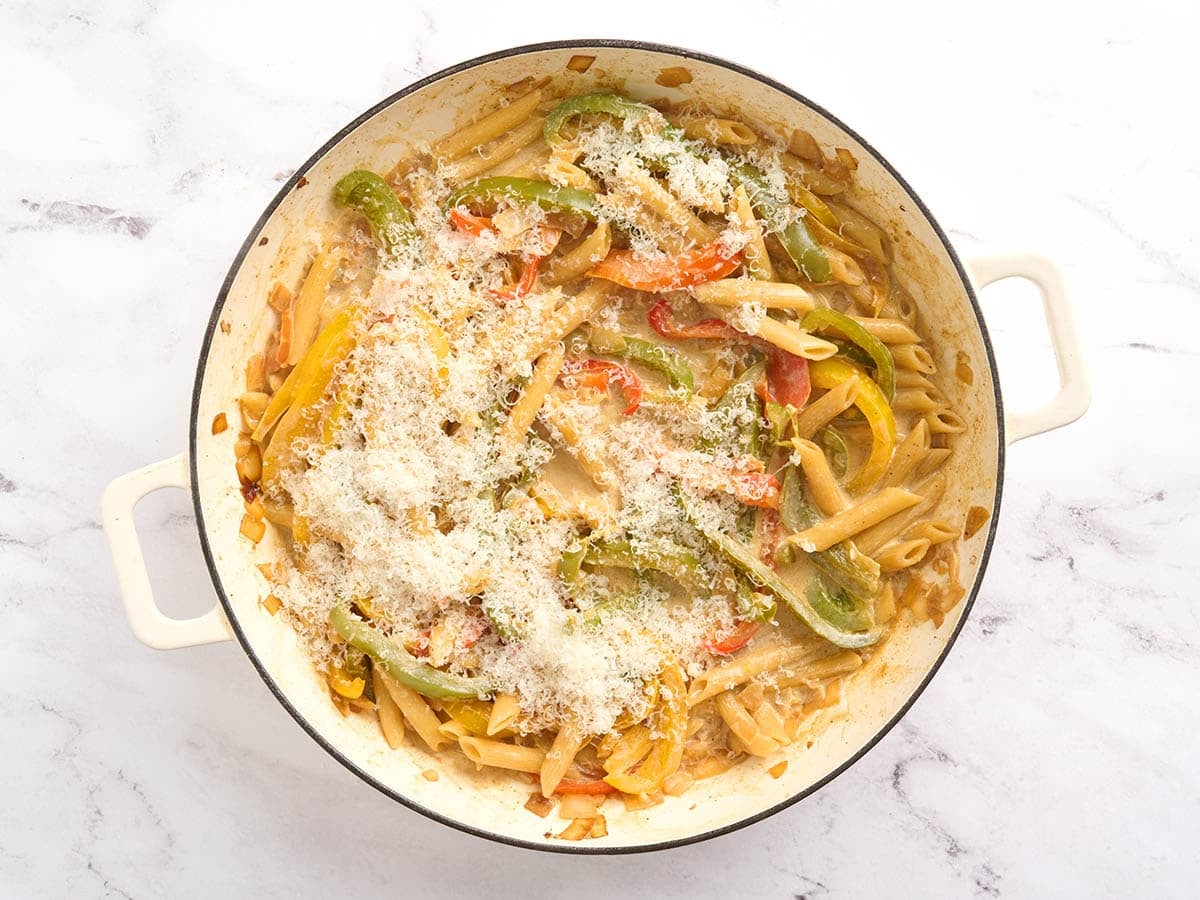 Parmesan cheese added to rasta pasta.