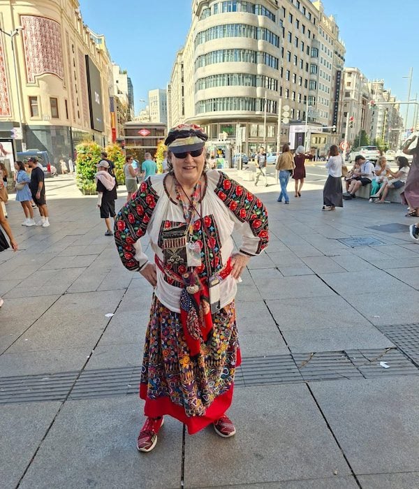 A woman shows off her personal style on the street in Madrid