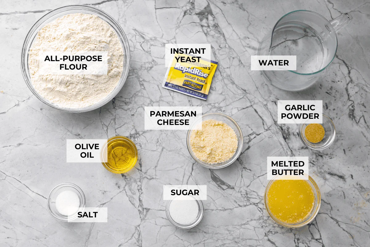 Overhead shot of labeled Little Caesars crazy bread ingredients. 