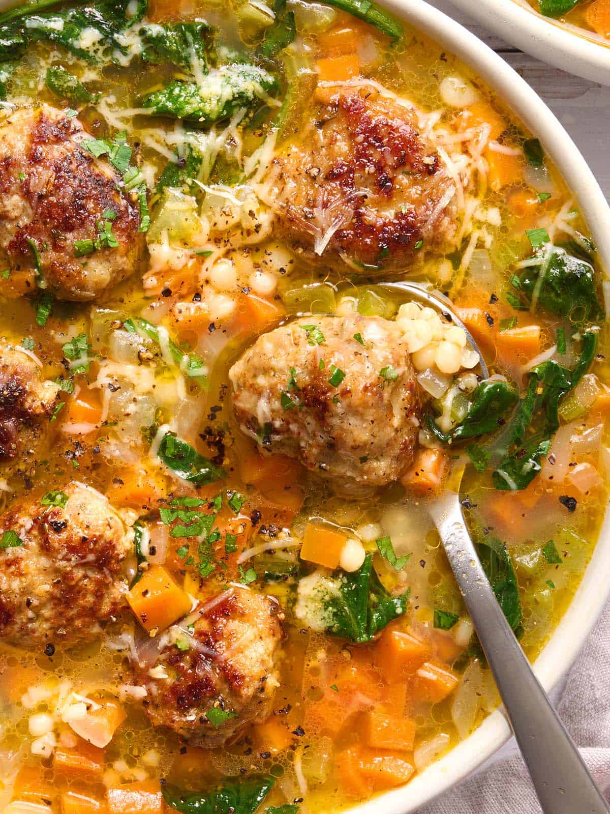 Overhead closeup view of Italian wedding soup.