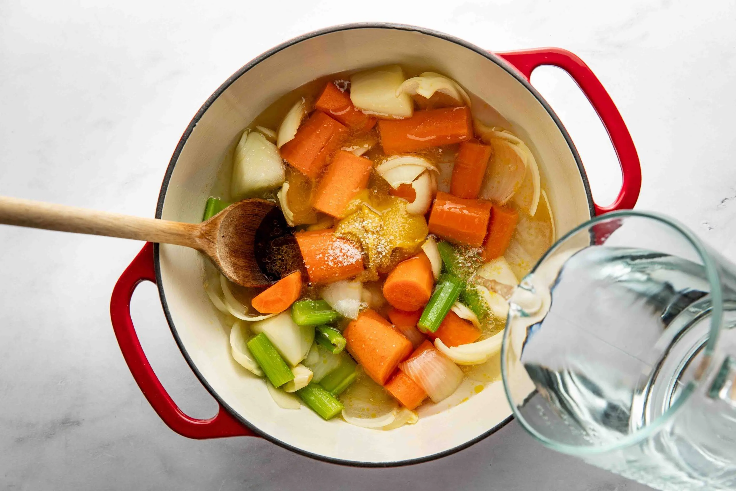 Simmering the vegetables in a stock pot