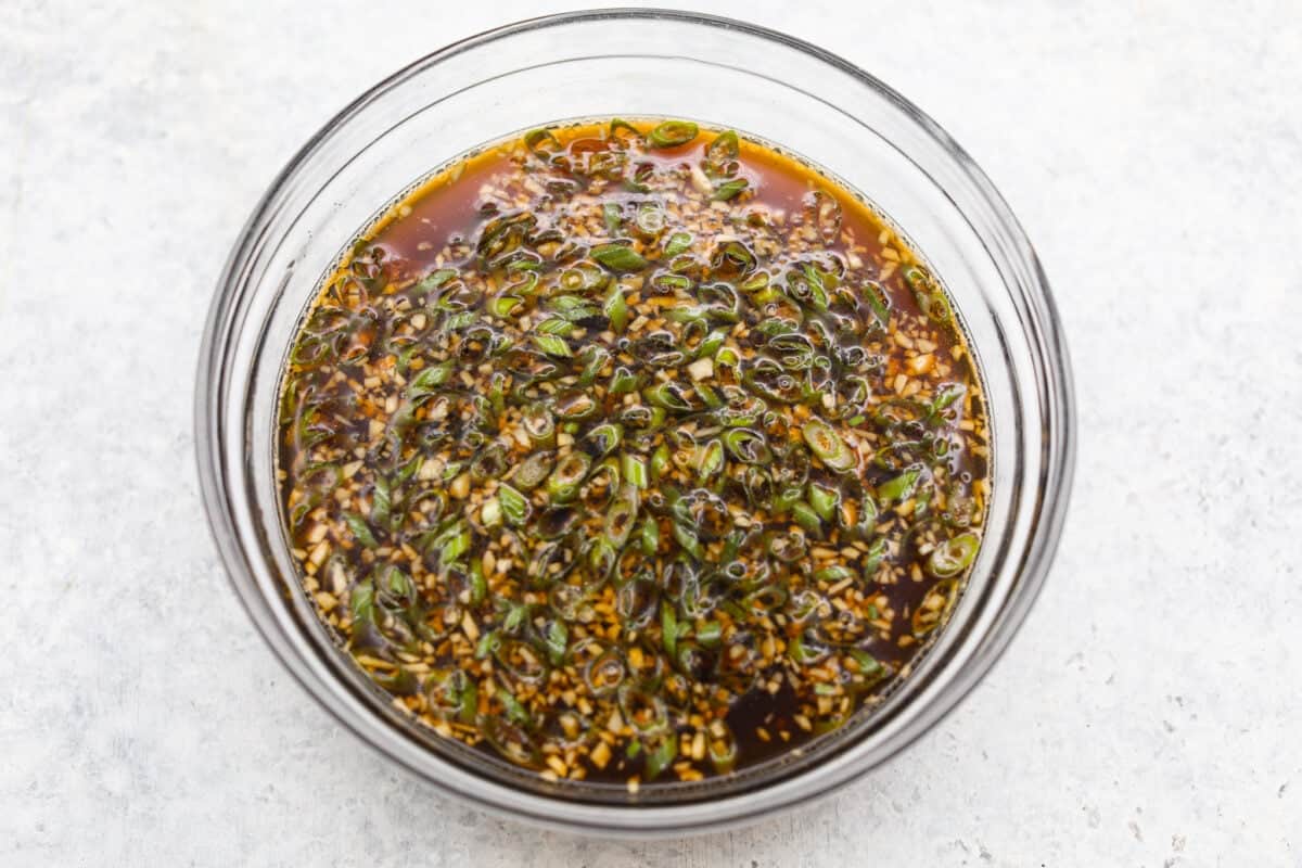 Bowl full of sauce ingredients combined. 
