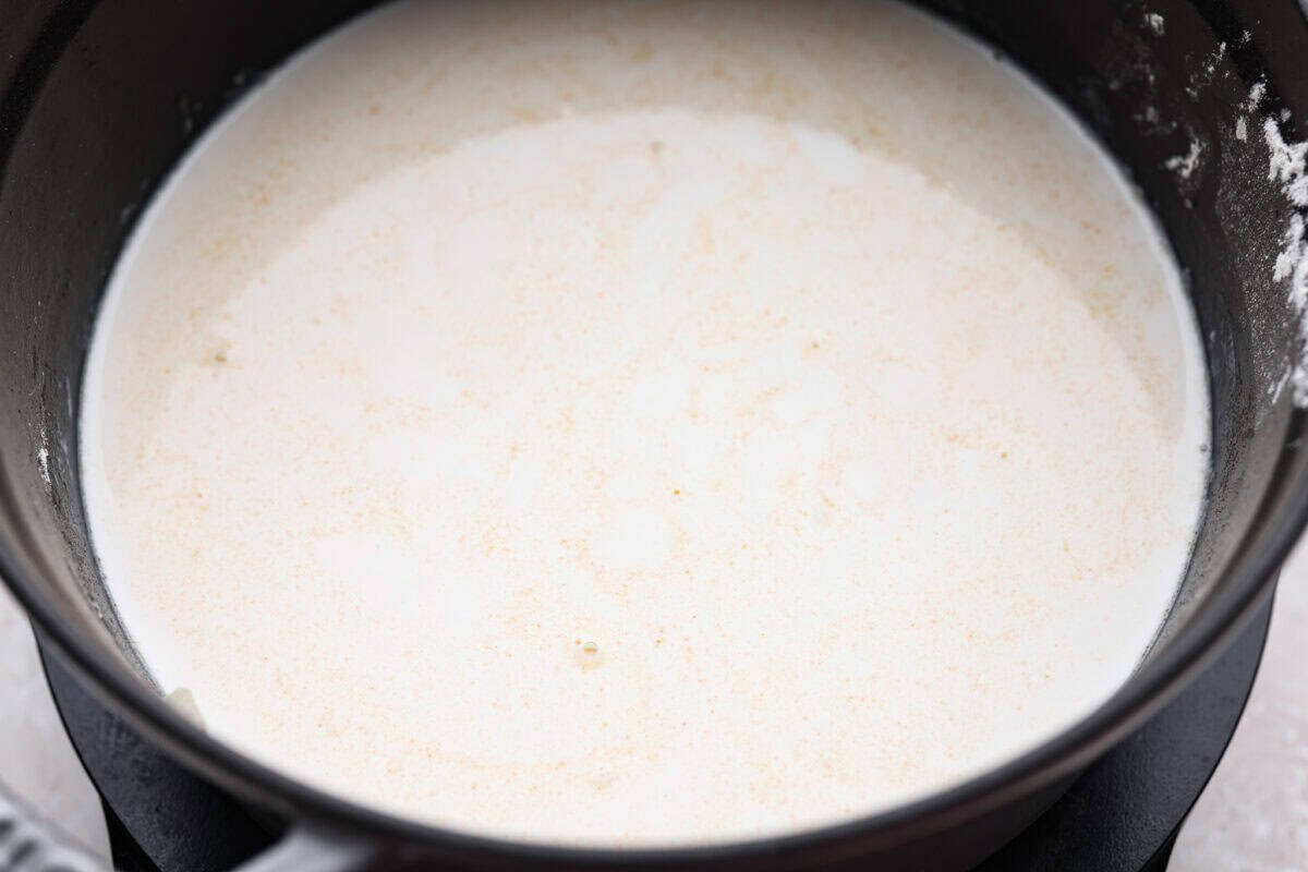 My creamy chicken gnocchi soup has everything I love about the Olive Garden favorite: tender chicken, pillowy gnocchi, fresh vegetables, and a rich, creamy broth. Even better, it comes together in just 30 minutes! Half and Half and chicken broth added to the pot.
